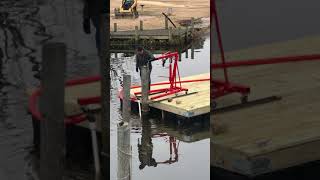 Tom pulling pilings in basin