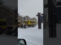 snowcoach tour buses in west yellowstone