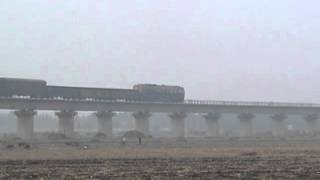 Chinese Railways - DF4C 4265 hauls a mixed freight over a huge viaduct at Zouxian, 16-9-2006