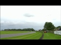 Incredible sight of 11 Spitfires and a Hurricane flying at Goodwood Revival