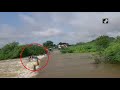 watch car washed away with passengers in ap’s anantapur