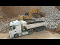 liebherr 974 excavator loading rocks on trucks sotiriadis labrianidis quarry works