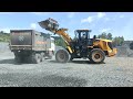 liugong 848h payloader loading sand and gravel to trucks