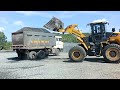 liugong 848h payloader loading sand and gravel to trucks