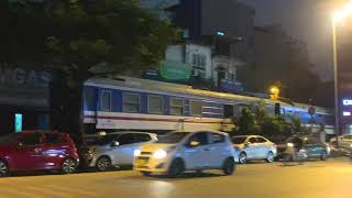 Freight train passes through Hanoi Train Street