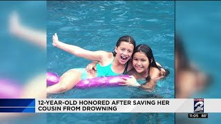 12-year-old honored after saving her cousin from drowning