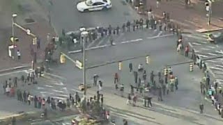 Protesters block major Baltimore intersection