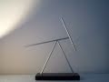 The Swinging Sticks Big - Iron Man 2 - Kinetic Energy Sculpture - Perpetuum Mobile Illusion The Swinging Sticks Big - Iron Man 2 - Kinetic Energy Sculpture - Perpetuum Mobile Illusion