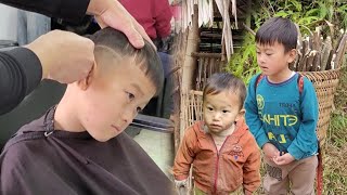 Two orphan boys were happy when a kind man took them to get a haircut.