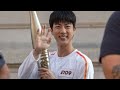 240714 Jin 김석진 of BTS carries the flame at the Olympic Torch Relay in Paris 🇫🇷 1st Torchbearer 🔥