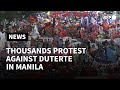 Protesters call for Philippines’ Duterte to step down as leader defends war on drugs | AFP