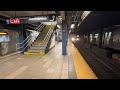 New York, New York - B & M Trains at the Broadway-Lafayette Street Station