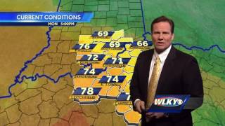 Passing clouds, mild into Tuesday