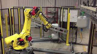 Automated Well Tank Handling System with FANUC R-2000iC Robot - Motion Controls Robotics