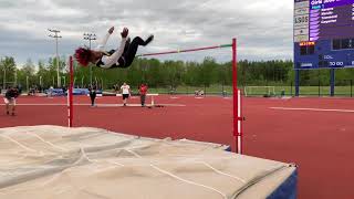 Henninger High School high jumper Kwamere White clears 6' 9\