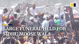 Thousands turn up at funeral of Punjabi rapper to mourn death of Sidhu Moose Wala