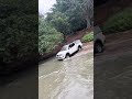 Mitsubishi triton vs FORD RANGER playing on the river