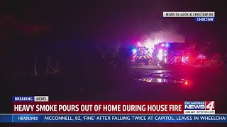 Firefighters battle house fire in Choctaw