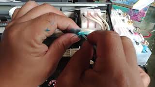 How to temporarily repair a hole in a Ink Tube on a Printer.