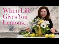 Learn to combine lemons with flowers in a whimsical arrangement #floralarrangements #floraldesign