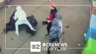Men caught on video beating NYPD officers in Times Square