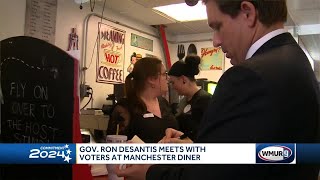Gov. Ron Desantis meets with voters at Manchester diner
