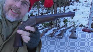 Dimwit the last mountainman, and his collection of Remington Rolling Block guns.