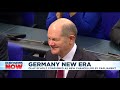 olaf scholz becomes germany s new chancellor as merkel bows out