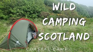 Wild camping Scotland. A misty camp at the beach.