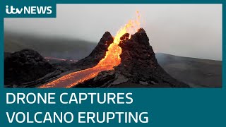 Spectacular drone footage of long dormant Iceland volcano erupting | ITV News