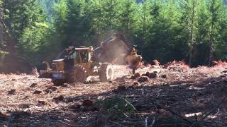 Tigercat 610C skidder with swing boom