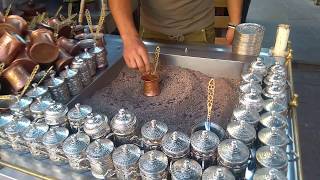 The real Turkish coffee cooked in the hot sand.