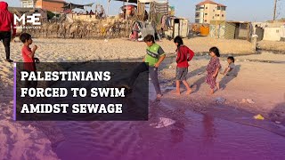 Displaced Palestinians forced to swim in sewage-polluted seawater to escape the heat