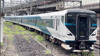 【E257系NA-05編成9両  OM入場回送（指定保全）】E257系2000番台ｵｵNA-05編成が回送電車として大宮駅13番線に到着停車するシーン（回8615M）2023.9.22