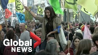 Climate protesters hold dance party in central Madrid