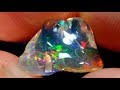 4.25ct water opal with play of colour bright carved