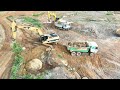 amazing breaking the big rock by excavator cat 320 with skilling full.