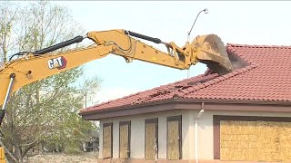 Federal officials begin demolition of Return to Nature funeral home in Penrose