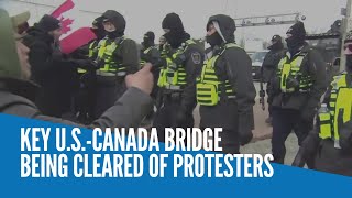 Key US-Canada bridge being cleared of protesters