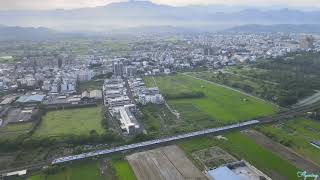 2023/05/06晨飛100M空拍苗栗市宜春路平交道列車