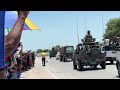 emotions fill the air as the crowds sings liberation songs when the procession of the vehicles