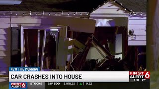 Police respond after truck crashes into Ralston home