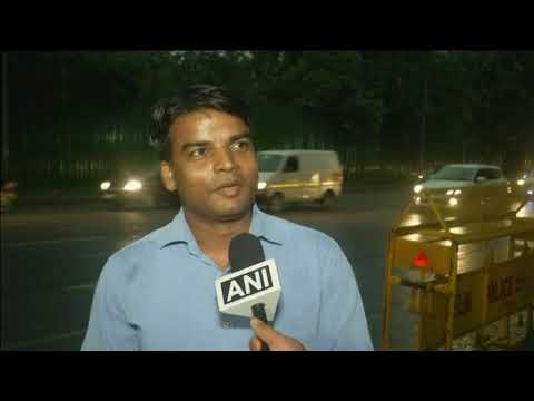 People get respite as rains lash Indian capital People get respite as rains lash Indian capital