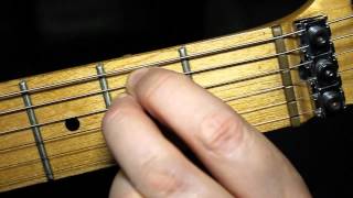 How to play guitar chords - Absolute beginners guitar lesson.
