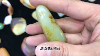 问几颗凑合着能玩的和田玉籽料原石巿场行情