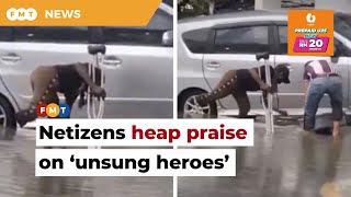 Netizens heap praise on ‘unsung heroes’ who braved KL floods to help people in distress