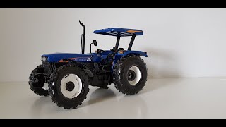 Miniatura de trator New Holland 7630