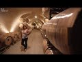 Why do California wineries build wine caves?