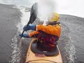 surfing a sea kayak...