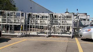 Dismantled sorting machine outside of USPS in Cascade Twp.